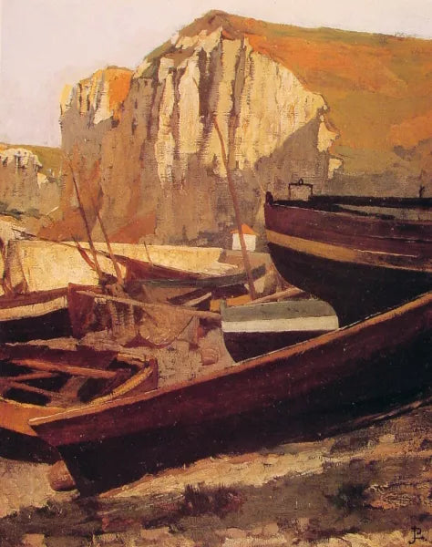 Barques au pied d'une falaise en Normandie